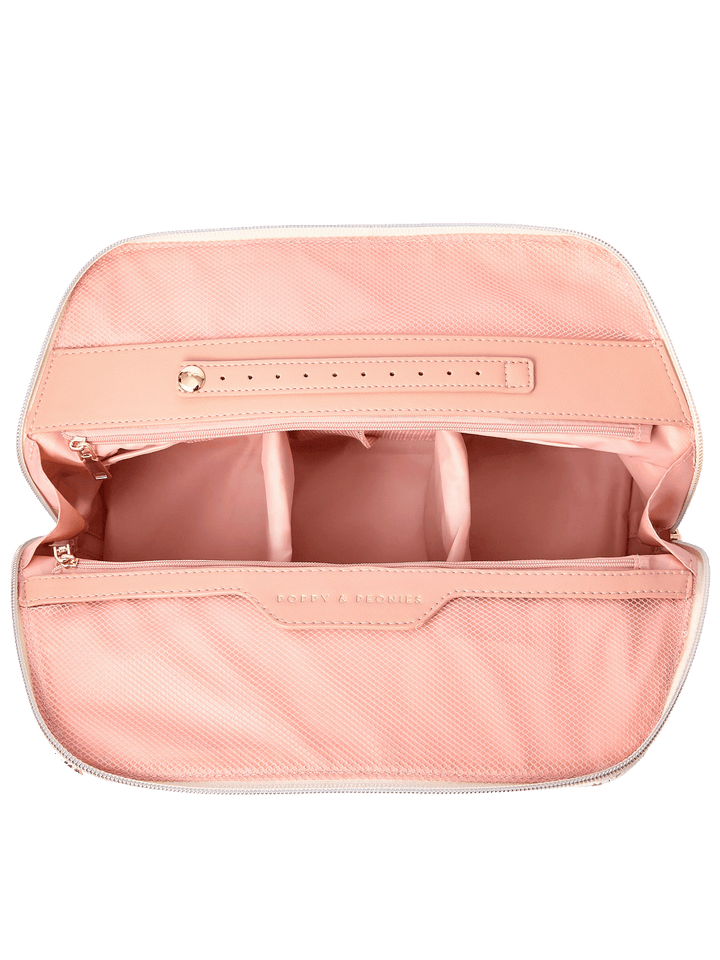 Sitting Pretty Cosmetic Case in Brown Patchwork opened to show spacious interior, zippered mesh pockets, and built-in jewelry tab