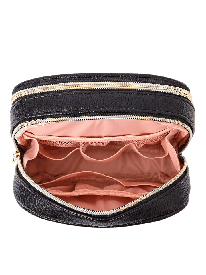 Pretty Connected Case in Black opened to show tech compartment with elastic organizers and mesh pockets