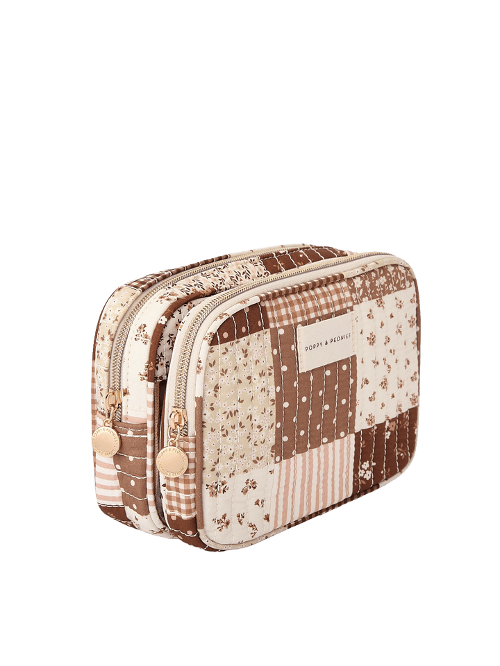 Angled side view of The Split Organizer in Brown Patchwork showing dual compartments