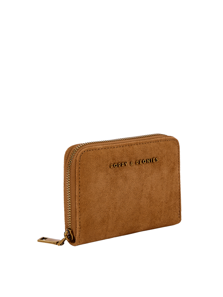 Poppy & Peonies The Grab and Go Wallet in Cognac Suede angled side view, highlighting the zip-around closure, structured shape and soft suede exterior.