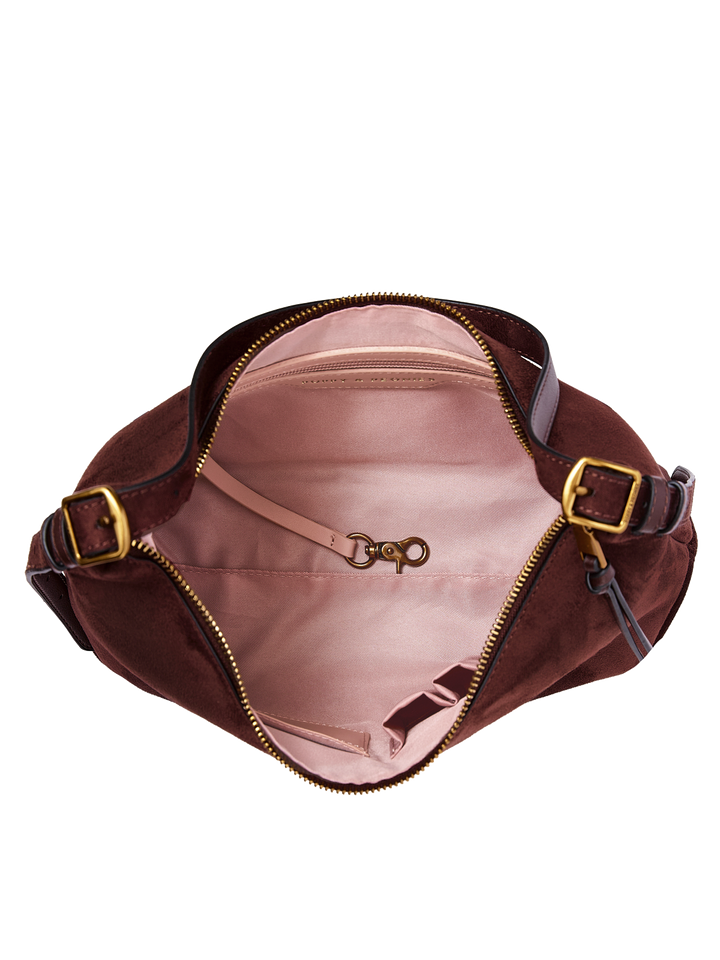 Poppy & Peonies The Sunday Bag in Espresso Suede open top view, showcasing the blush-pink lined interior, interior zippered pocket, key clip and slip pocket.