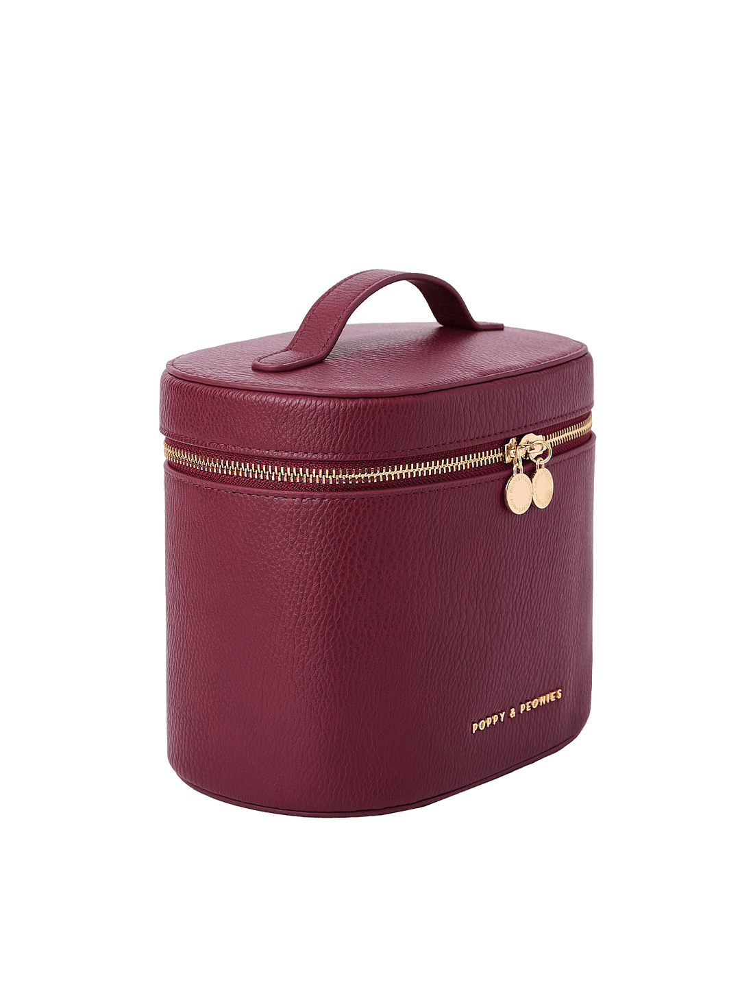 Poppy and Peonies The Vanity Case Berry displayed at a three-quarter angle, highlighting its structured silhouette, rich berry textured exterior, top carrying handle, gold-tone zipper hardware, and subtle Poppy and Peonies logo near the bottom.