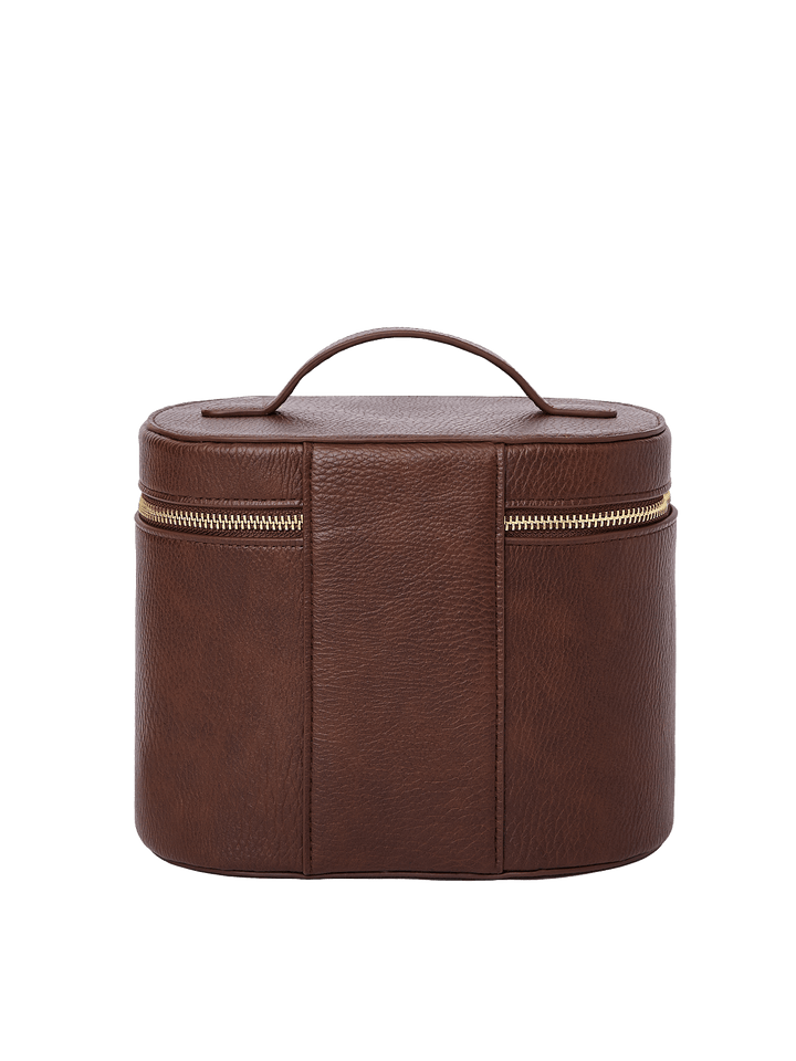 Poppy and Peonies The Vanity Case Espressso displayed from the back, featuring its textured espresso exterior, structured rounded silhouette, top carrying handle, and horizontal gold-tone zipper closure.