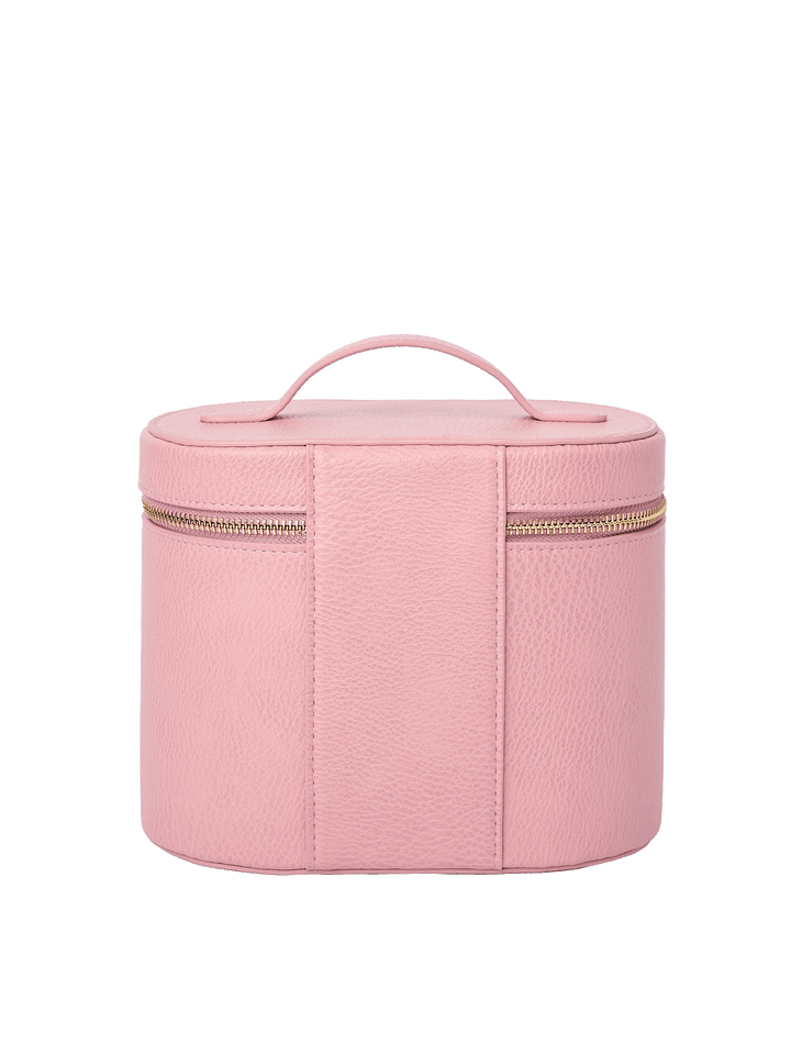 Poppy and Peonies The Vanity Case Rosé displayed from the back, featuring its soft pink textured exterior, structured rounded silhouette, top carrying handle, and horizontal gold-tone zipper closure.