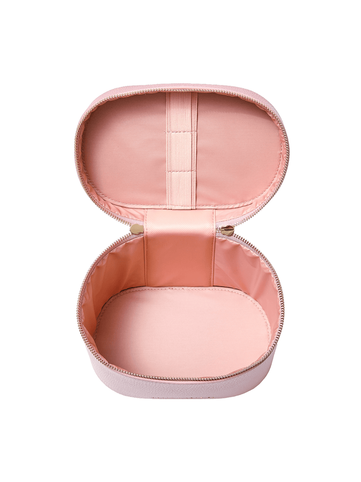 Poppy and Peonies The Vanity Case Rosé displayed fully open from the front, showcasing its blush pink lining, interior elastic strap, spacious storage compartment, and gold-tone zipper hardware.