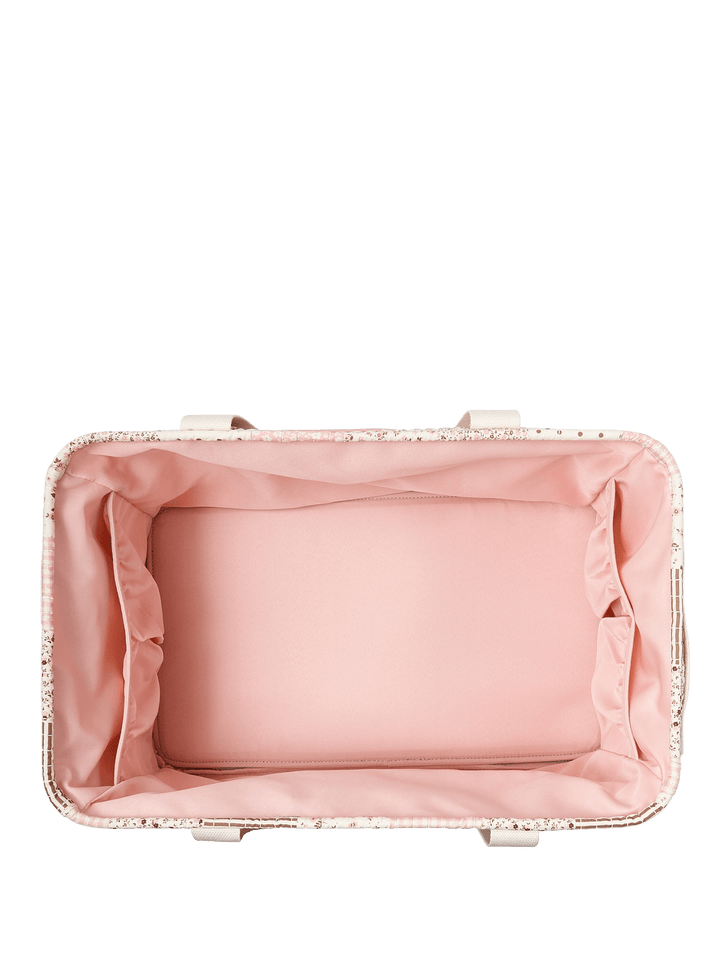 Interior of a tote bag with a pink lining