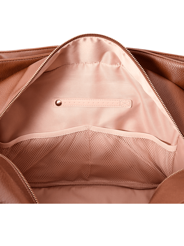 Close-up of the interior of a brown vegan  leather bag