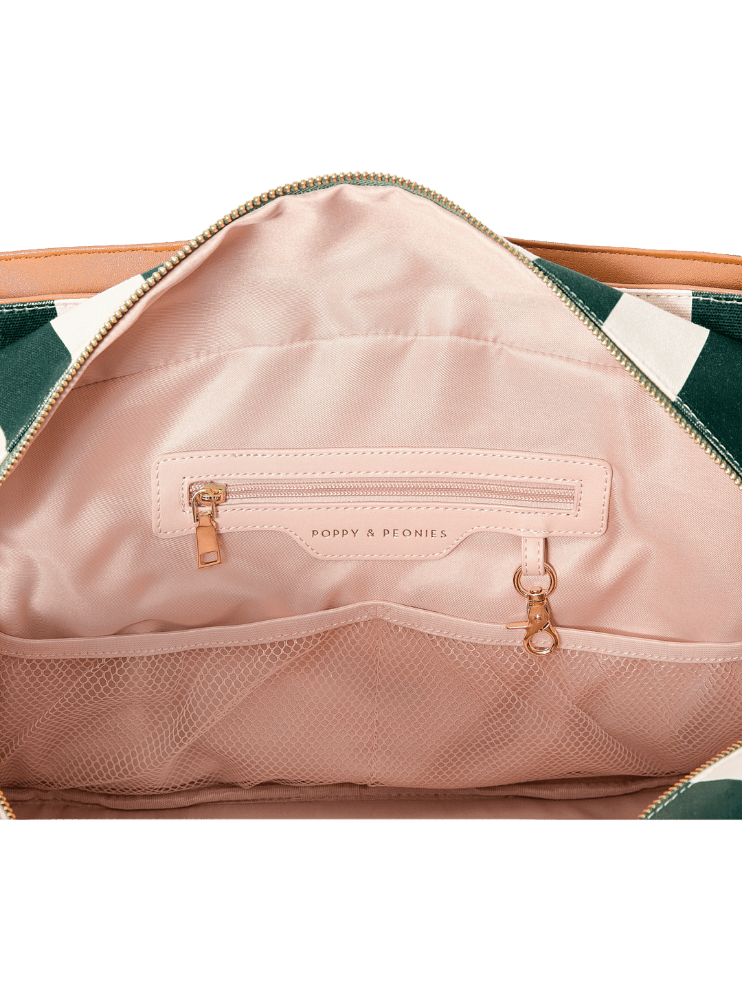 Close-up of the inside of a handbag with pockets and a key leash