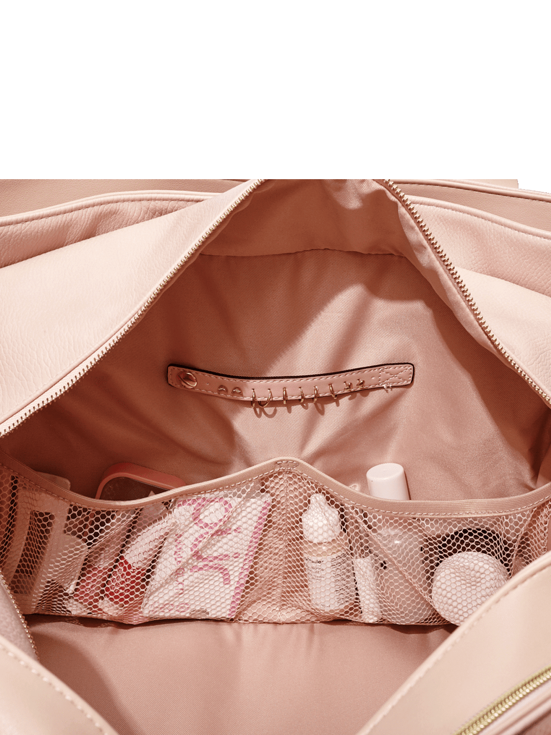 Open blush bag with mesh pockets and a jewelry tap