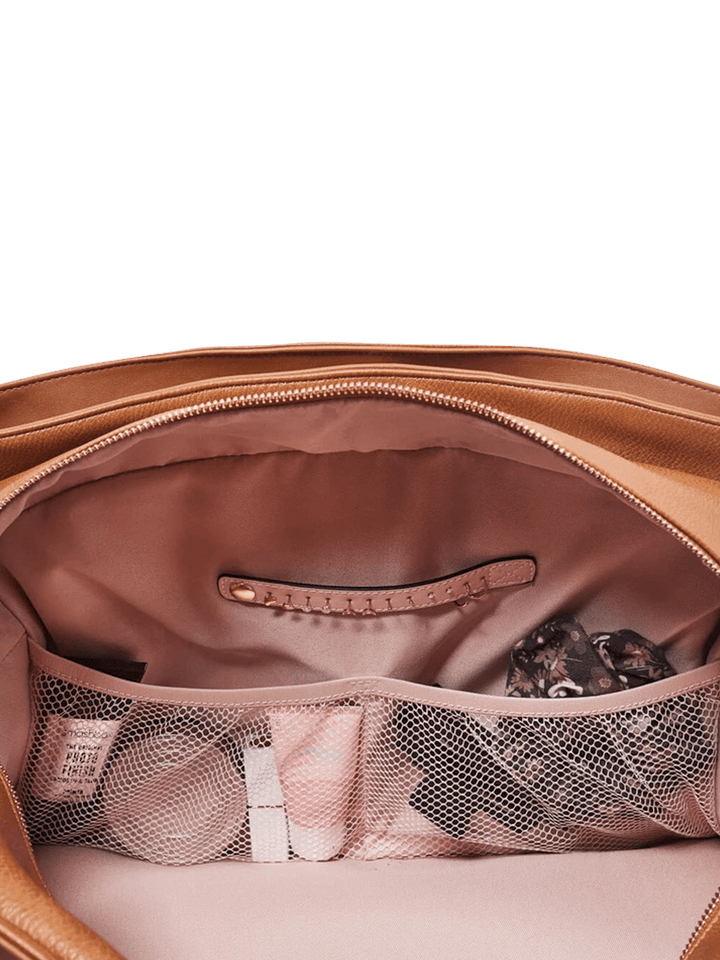 Brown leather bag with mesh pockets and a jewelry tab