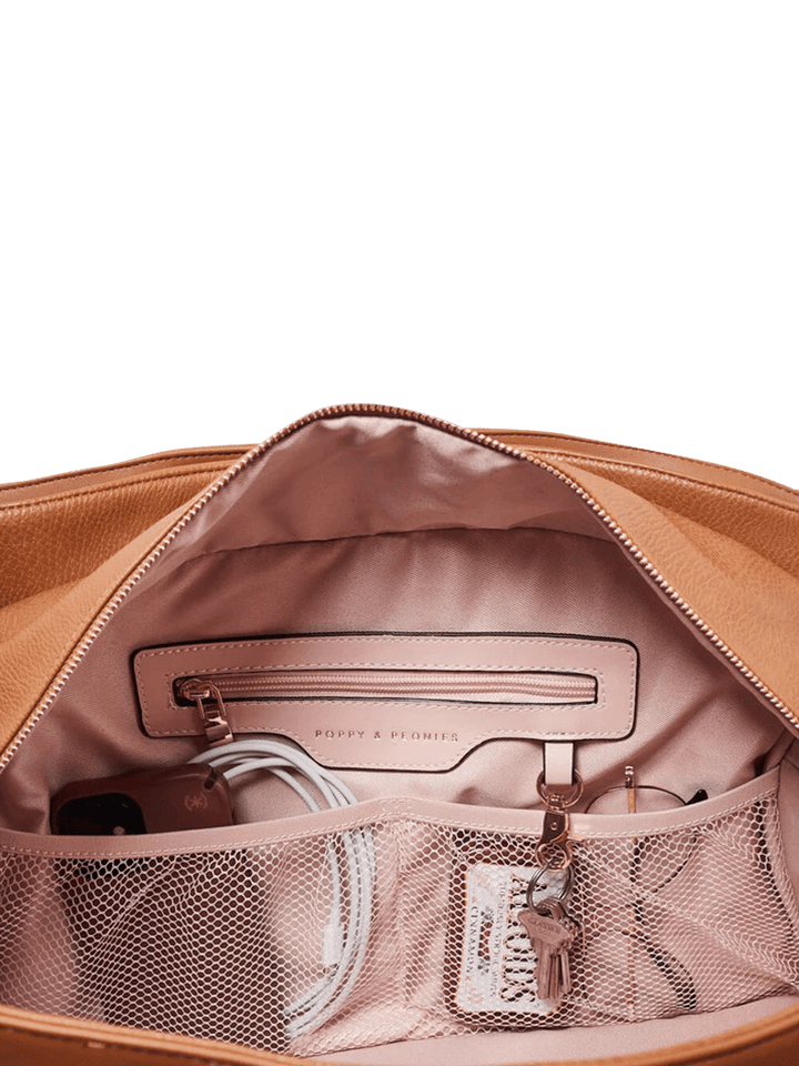 Brown leather handbag with mesh and zip pockets