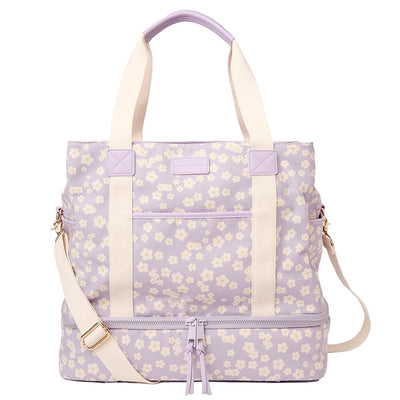 Front of a violet floral Poppy and Peonies travel bag