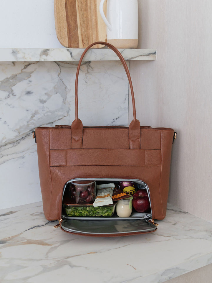 Poppy & Peonies Double Duty Tote in Chestnut showcasing the insulated lunch compartment with lunch and snacks.