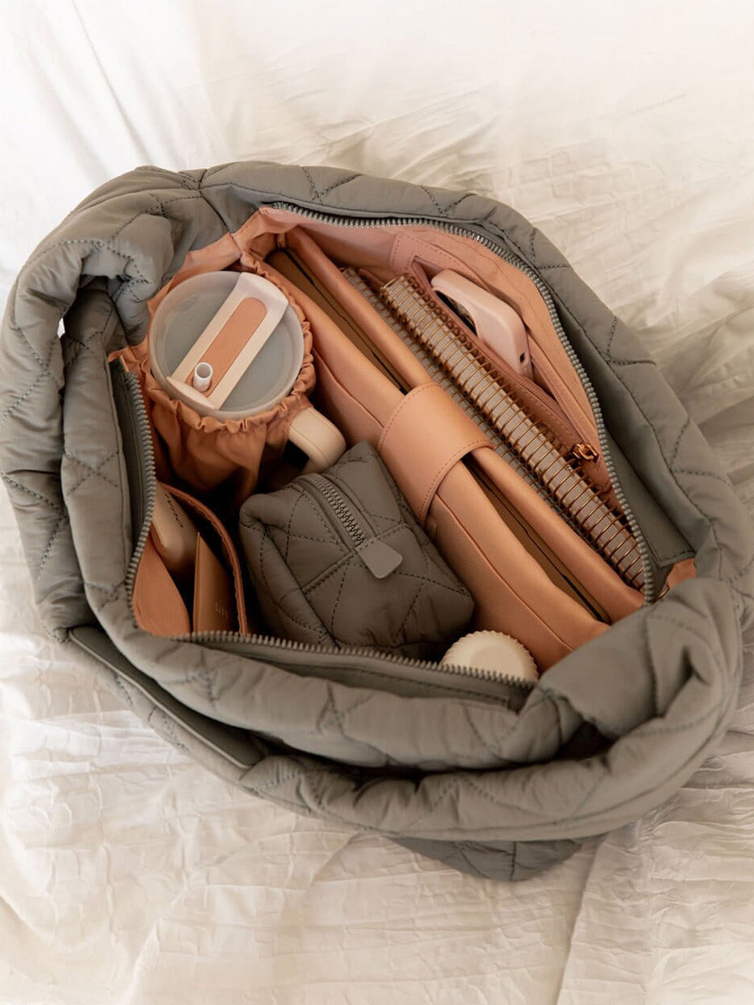 Interior of a grey quilted bag 