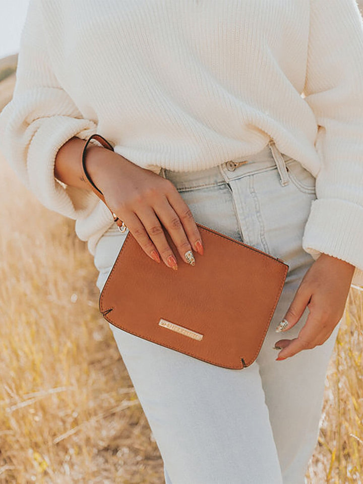 the EVERYDAY CROSSBODY cognac